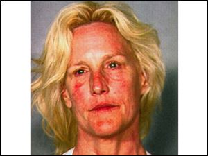 This Clark County Dentention Center booking photo shows environmental activist Erin Brockovich, 52, who was arrested late Friday on suspicion of boating while intoxicated at Lake Mead near Las Vegas.