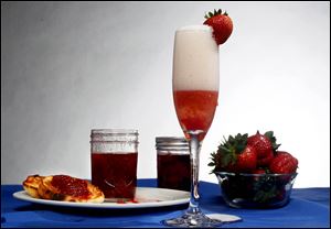 Strawberries, strawberry jam and champagne with strawberry and sugar.