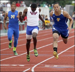 Findlay’s Tyler Brown wins the 400-meter dash at the Division I state meet in Columbus. Brown also captured the high jump title and was second in the long  jump.