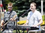 Mike Coulter, left, and Scott Ballard, right,  of Skoobie Snaks, who will play at Saturday's event in Perrysburg.