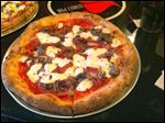  A build-your-own pizza with mozzeralla cheese, mushrooms, pepperoni, and pancetta.