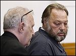  Andrew Gustafson of Birch Run, Mich., right, was ordered held on $1 million bond by Common Pleas Judge Gary Cook. Attorney Bobby Kaplan is at left. 