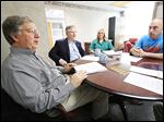  From left, Bill Siderewicz and Bill Martin, managing partners of North America Project Development LLC; Lindsay Myers, executive director of Oregon Economic Development Foundation, and Oregon Mayor Mike Seferian discuss the Oregon Clean Energy Project at the mayor's office.