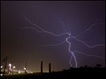  Bolts of lightning fill the sky as severe storms move through the Toledo area about midnight Wednesday.