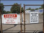  The pool at Ravine Park in East Toledo is pictured, Thursday, July 12, 2012.  Toledo city councilman Mike Craig called for a halt to the proposed demolition of the pool during a news conference there.