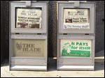  NEWSPAPER VENDING BOXES STANDING OUTSIDE THE TOLEDO BLADE BUILDING AT 541 NORTH SUPERIOR STREET. BLADE PHOTO BY JEREMY WADSWORTH