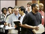  Representatives of Detroit's creditors leave a meeting after being told they'll get no more than 10 cents on the dollar of what they're owed. 