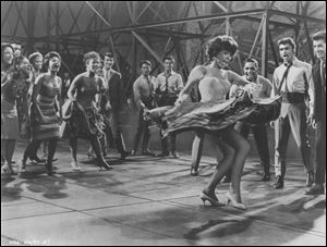 The 'West Side Story' sound­track was a fes­ti­val of over­dubs, with the mar­quee stars do­ing scarcely any of the sing­ing. Above, Rita Moreno dances during the Broadway production.
