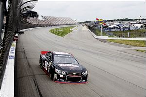 Dale Earnhardt, Jr., runs a practice lap for the Quicken Loans 400 at Michigan International Speedway.