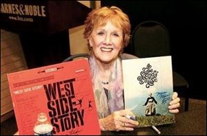 Marni Nixon holds album covers from ‘West Side Story’ and ‘Sound of Music, two of the productions on which she worked.