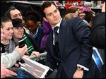  Actor Henry Cavill signs autographs for fans at the European premiere of 'Man Of Steel' in London on Wednesday.
