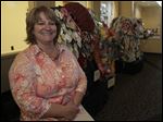  Jodi Russ, community librarian at the Bedford Public Library of the Monroe County Library System, says patrons love the elephant sculptures created by elementary students from across the county.
