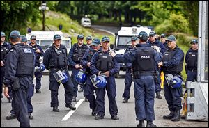 Riot police drill near the Lough Erne resort in Northern Ireland. Security preparations were under way Sunday for the G8 summit that starts today.