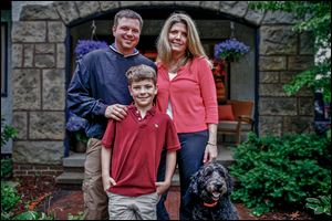 Jamison and Jennifer Diehl, with their son John, 11, and dog Trigger, were adopting a Russian boy, 6. Their plans went on hold  in December when Russia banned adoptions by U.S. citizens.