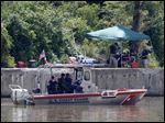  FBI personnel, on shore, and a Coast Guard boat, conduct another search today in the Maumee River for Elaina Steinfurth.