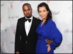  Kanye West and girlfriend Kim Kardashian attend a benefit in New York.
