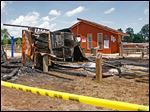  The destroyed concession stand near the swimming area at Olander Park in Sylvania Township.