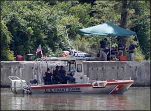 FBI personnel, on shore, and a Coast Guard boat, conduct another search today in the Maumee River for Elaina Steinfurth.