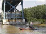  A Coast Guard boat searches the Maumee River for 18-month-old Elaina Steinfurth on Tuesday. She went missing from her east side home on June 2. 