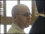  John T. Millinger is sentenced at the Wood County Courthouse in Bowling Green.