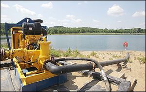 This Chesapeake Energy Corp. water collection station is part of a fracking site at a private lake in Carroll County, Ohio.