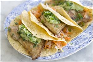 Healthy fish tacos with avocado.
