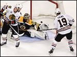  Chicago’s Jonathan Toews scores a goal past Boston goaltender Tuukka Rask in the second period in Game 4 of the Stanley Cup finals.