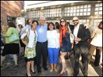  Liz Jacoby Jeff Anderson Karen Miller Alison Reny and Tony Calabrese enjoy wine in TSA's Sculpture Garden.