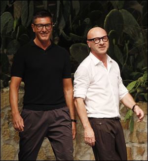 Italian fashion designers Stefano Gabbana, left, and Domenico Dolce.