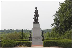 The entrance to Hood Park, which includes a statue of Commodore Perry, is up for renovation alongside Perrysburg's Riverside Park and Orleans Park.