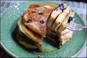 Mouth-watering, sweet, and tangy pancakes celebrate blueberry season. 