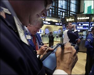 Global stock markets staged a modest recovery today boosted by strong data releases that portray a U.S. economy on the upswing.