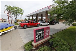 Lines form as gas is down to 2.89 a gallon at the Speedway on Conant and E. John in Maumee.