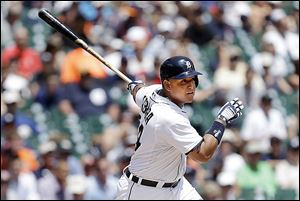 The Tigers' Miguel Cabrera hits a double in the third inning against the Los Angeles Angeles.