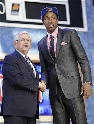 David Stern congratulates Georgia guard Kentavious Caldwell-Pope, who was selected by the Pistons with the No. 8 pick.