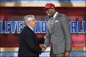 NBA Commissioner David Stern, left, shakes hands with UNLV's Anthony Bennett, who was selected first overall by Cleveland.