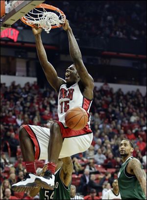 UNLV's Anthony Bennett (15) dunks the ball against Chicago State in the first half during an NCAA college basketball game in Las Vegas. 