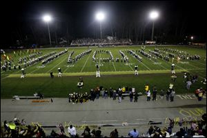 The Northview and Southview Marching Band spell out 