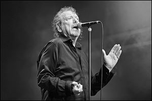 Former Led Zeppelin lead singer Robert Plant performs on stage with his new band The Sensational Space Shifters at Bluesfest Byron Bay 2013 in Australia.
