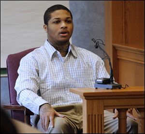 James Moore testifies during the trial of Keshawn Jennings and Antwaine Jones. All three were charged in the shooting death of  Keondra Hooks, 1, at the Moody Manor apartments in Toledo. Moore negotiated a plea deal in exchange for testifying against Jennings and Jones.