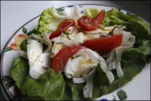 A tomato, basil and fennel salad with lemon vinaigrette.