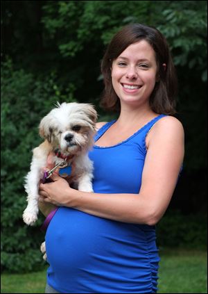 Lindsay Sopko of Toledo is fostering  Wink, a one-eyed Shih Tzu-mix. She and her husband have four other dogs and a cat.