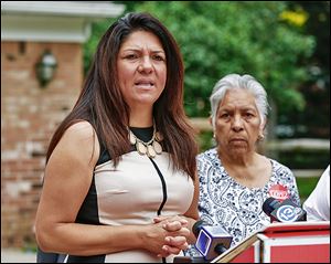 Anita Lopez, Democratic candidate for mayor of Toledo, discusses her personal finances at her south Toledo home, along with her mother, Minerva Lopez.