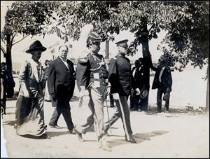 William Howard Taft, in suit, by then a former president, attended the September, 1913, dedication ceremony when the remains of three American and three British officers were buried beneath the rotunda floor.