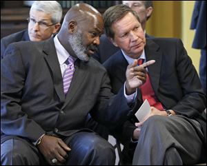 ‘Mike Bell is my buddy,’ Ohio Gov. John Kasich, a Republican, has said of Toledo Mayor Mike Bell, an independent.