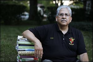 Manuel Caro, 66, of South Toledo says he has found healing through reading. His first therapist after Vietnam ignored his cultural background, he said. 