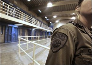 A correctional officer is seen in one of the housing units at Pelican Bay State Prison near Crescent City, Calif. 