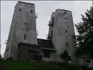 The tops of the Irish Hills towers were removed this week  to stabilize the structures. The landmarks have drawn visitors for viewing the landscape.
