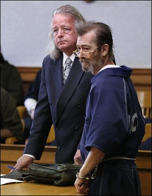 Aubrey Dale Marshall, 58, a registered sex offender, stood with attorney Adrian Cimerman at his May arraignment in Lucas County Common Pleas Court. 