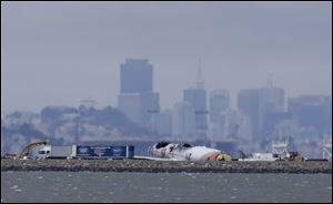 One of the victims in the Asiana Flight 214 crash was hit afterward by a fire truck, police said. 